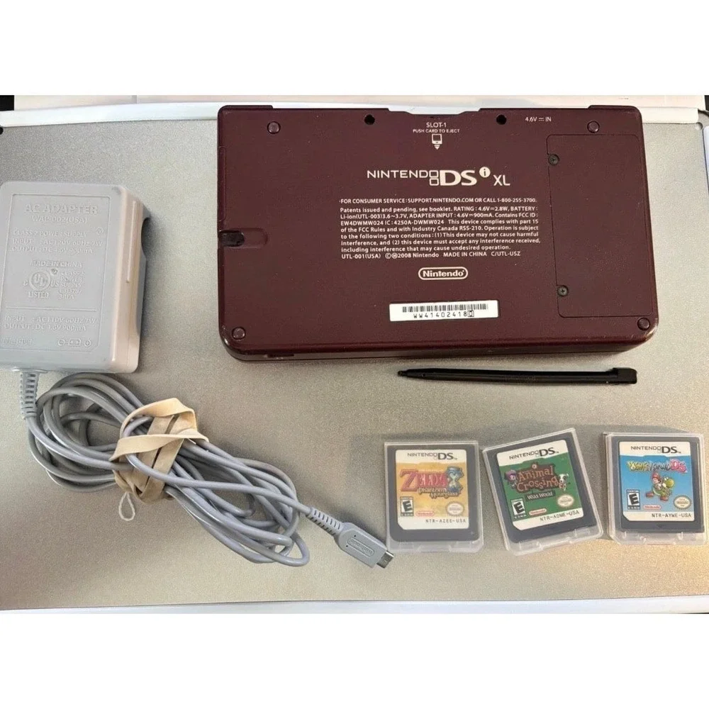 Nintendo DSI xl with three game bundle